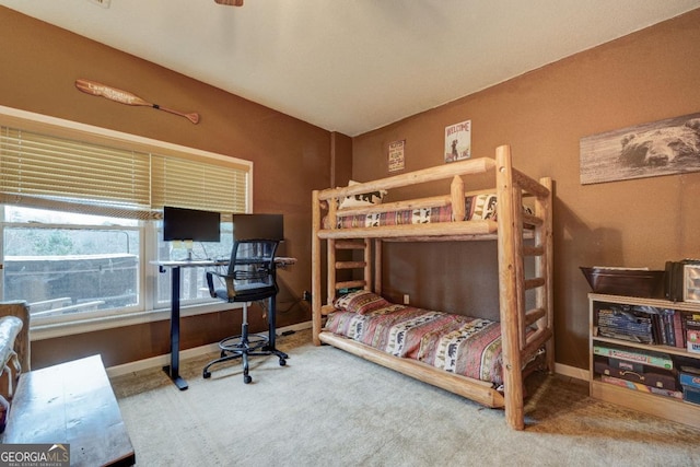 bedroom featuring carpet