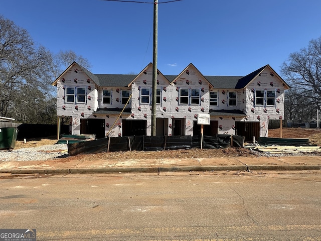 property under construction with a garage