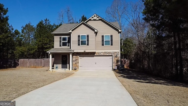 view of front facade with a garage and a front yard