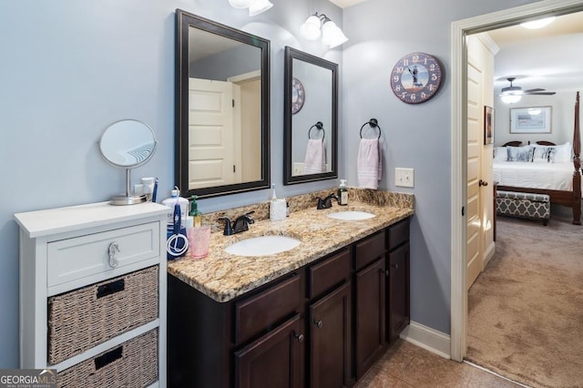 bathroom with ceiling fan, vanity, and tile patterned flooring