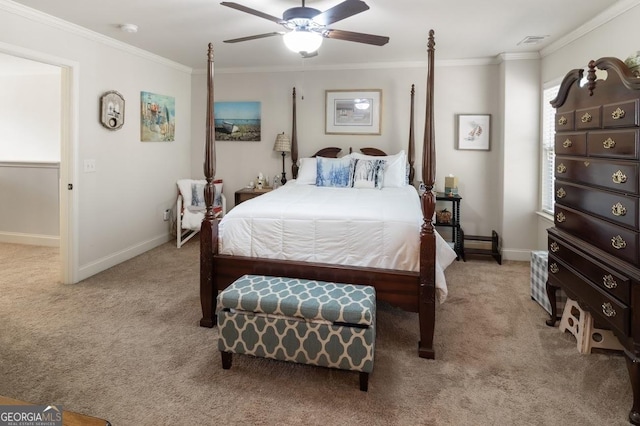 carpeted bedroom featuring crown molding and ceiling fan