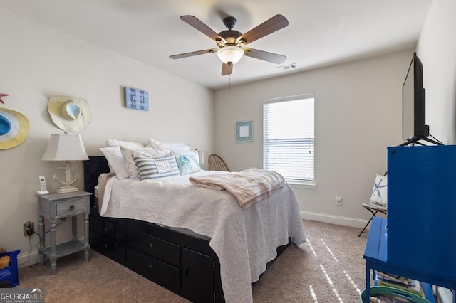 bedroom with light carpet and ceiling fan