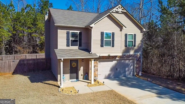 front of property with a garage