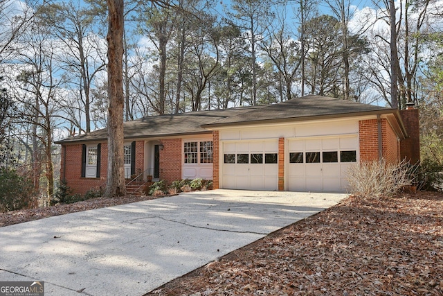 ranch-style home featuring a garage