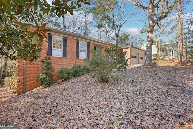 ranch-style house featuring a garage