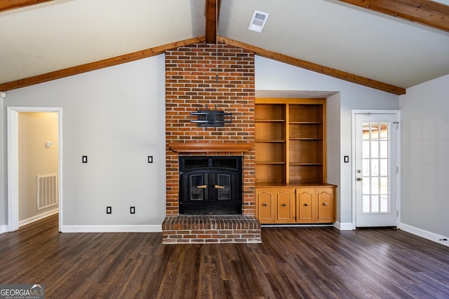 unfurnished living room with vaulted ceiling with beams, a fireplace, and dark hardwood / wood-style floors