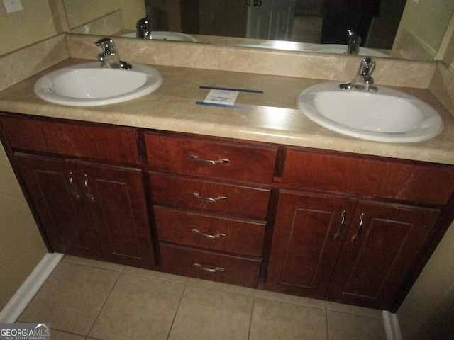 bathroom with vanity and tile patterned flooring