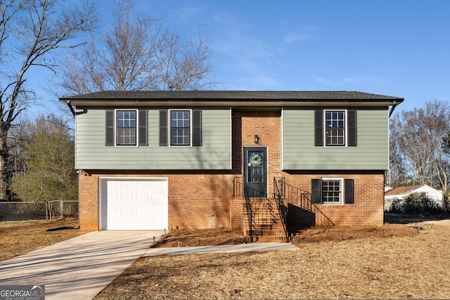 raised ranch featuring a garage