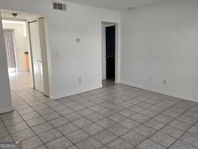 view of tiled empty room