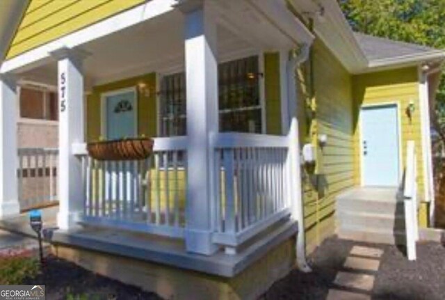 view of home's exterior with covered porch