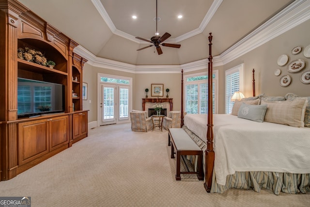 bedroom with crown molding, light colored carpet, access to exterior, and ceiling fan