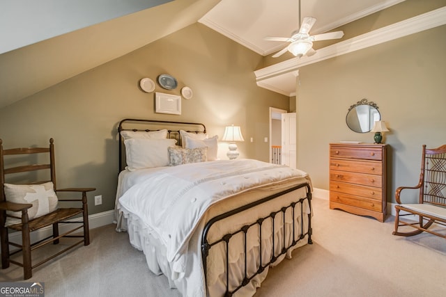 carpeted bedroom featuring vaulted ceiling, ceiling fan, and crown molding