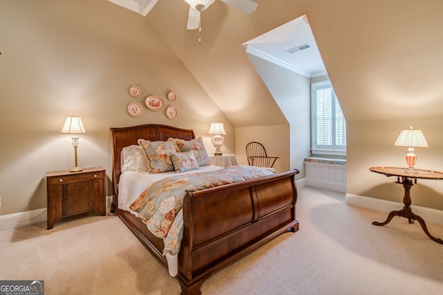 bedroom with ornamental molding, lofted ceiling, and light carpet