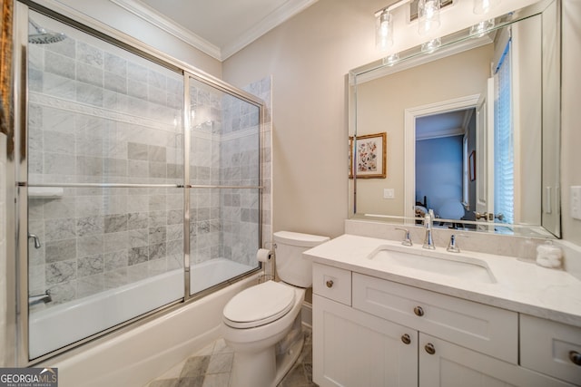 full bathroom featuring enclosed tub / shower combo, crown molding, vanity, and toilet