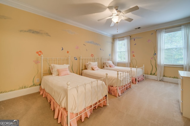 carpeted bedroom with crown molding and ceiling fan