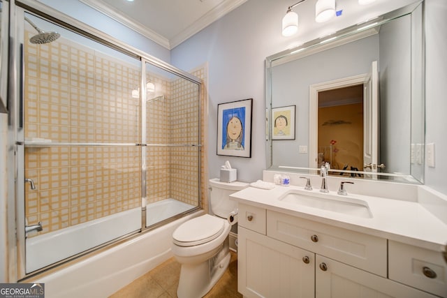 full bathroom featuring tile patterned floors, toilet, shower / bath combination with glass door, ornamental molding, and vanity