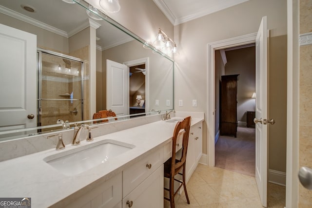 bathroom featuring vanity, tile patterned floors, a shower with shower door, and ornamental molding