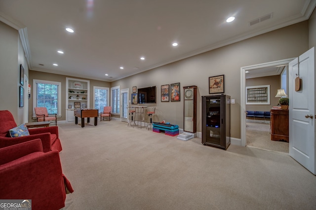 rec room with light carpet and crown molding