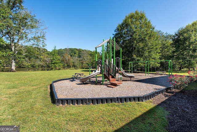 view of jungle gym featuring a yard