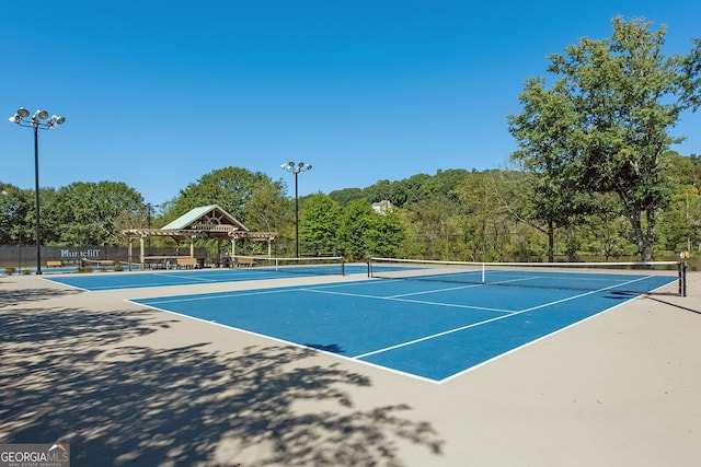 view of sport court featuring a gazebo