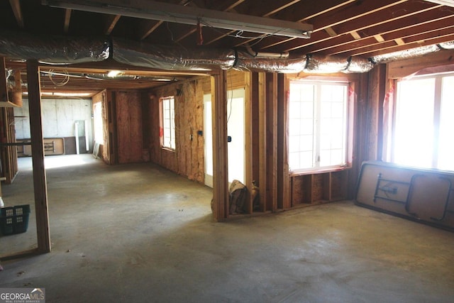 misc room with concrete flooring