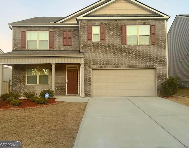 view of front facade featuring a garage