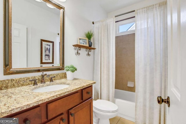 full bathroom featuring vanity, toilet, tile patterned flooring, and shower / tub combo