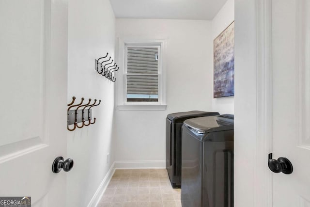 washroom featuring independent washer and dryer