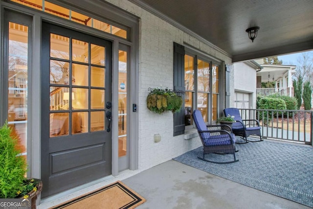 property entrance featuring a porch