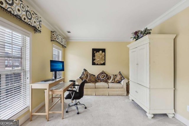 office featuring crown molding and light colored carpet