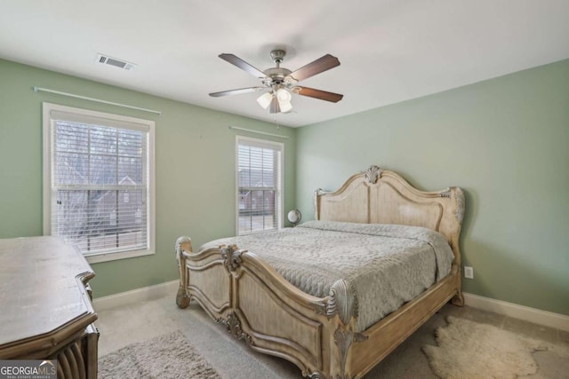 carpeted bedroom featuring ceiling fan