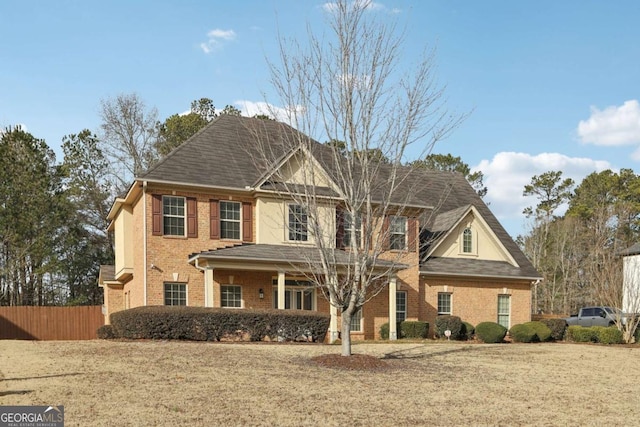 front facade with a front lawn