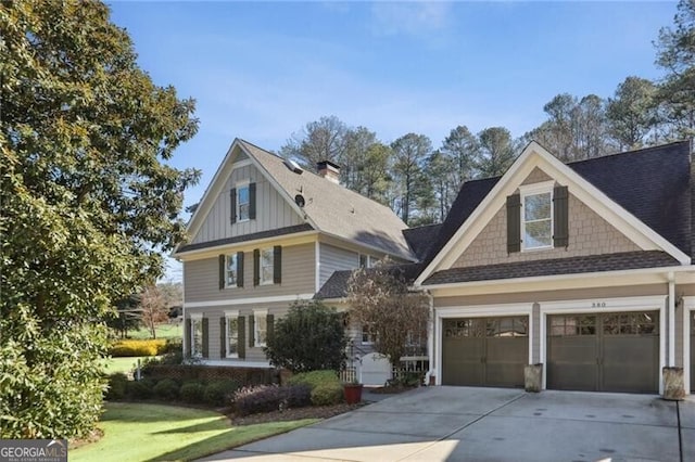 craftsman inspired home with a garage