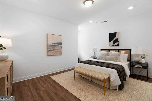 bedroom featuring hardwood / wood-style flooring