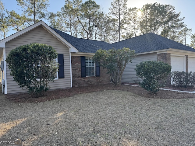 single story home with a garage