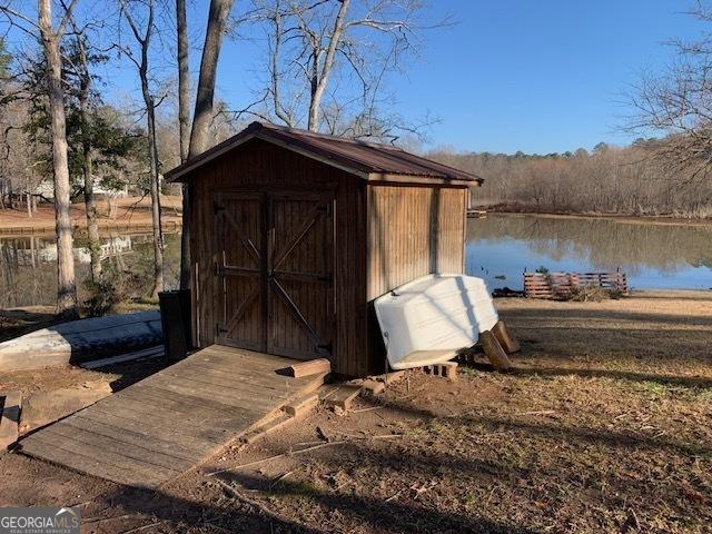 view of outdoor structure featuring a water view