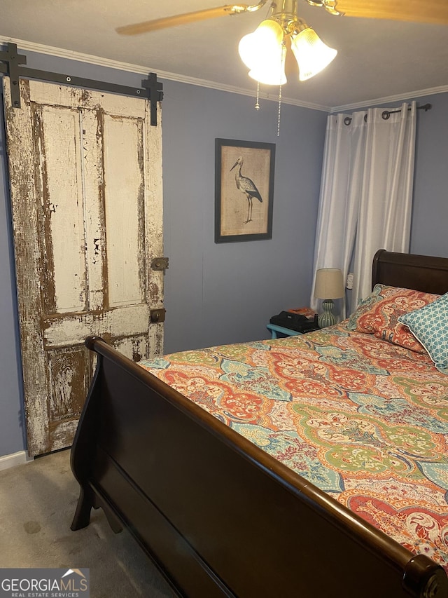 carpeted bedroom featuring ceiling fan and ornamental molding