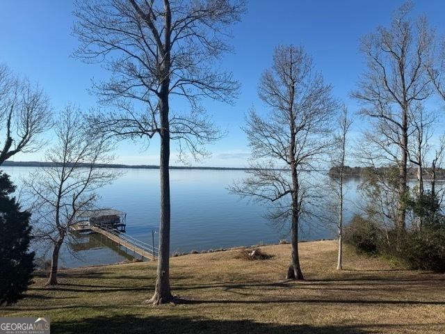 property view of water with a floating dock