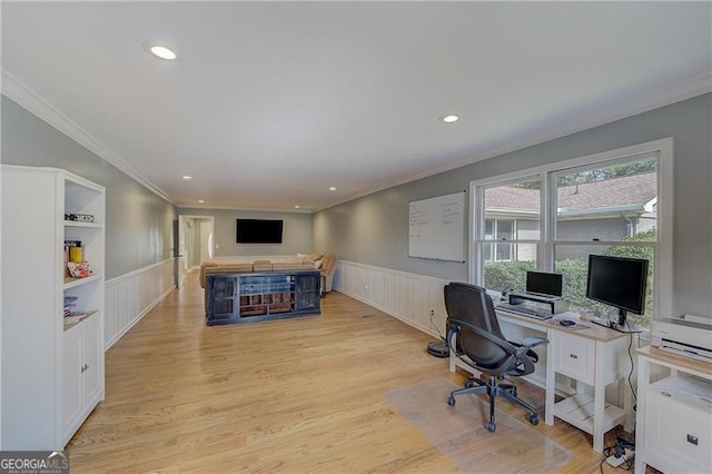 office area featuring light hardwood / wood-style flooring and ornamental molding