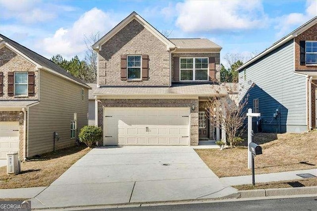 front of property featuring a garage