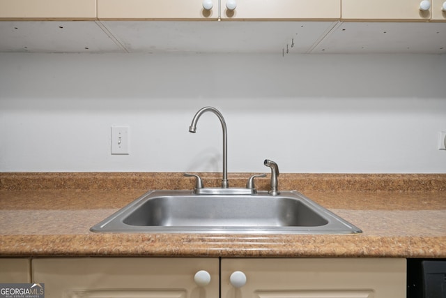 interior details with cream cabinets and sink