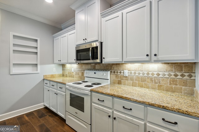 kitchen with dark wood-type flooring, white range with electric stovetop, light stone counters, ornamental molding, and white cabinets