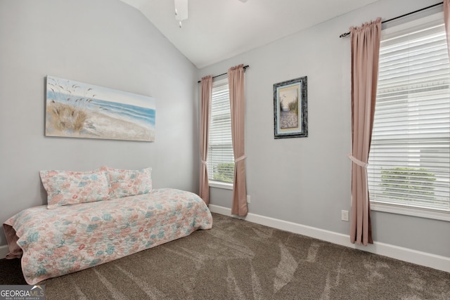 carpeted bedroom with lofted ceiling and ceiling fan