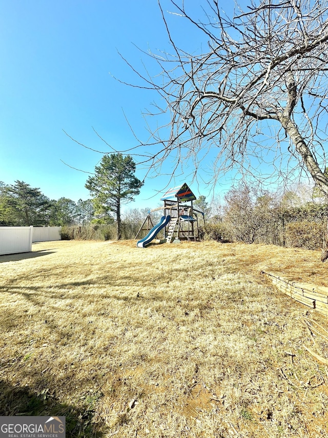 view of yard with a playground