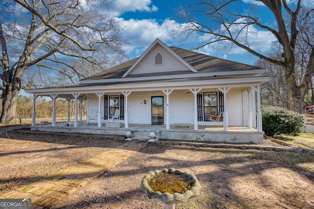 farmhouse inspired home with a porch