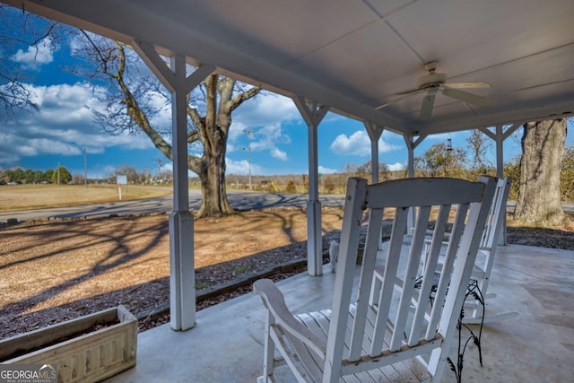 view of patio featuring ceiling fan