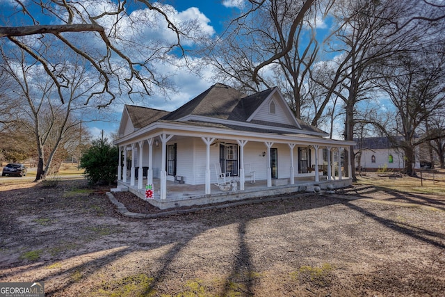 farmhouse inspired home with covered porch