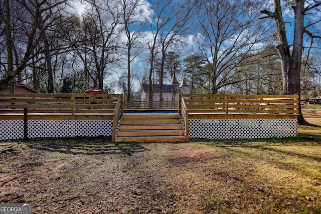 view of yard with a deck