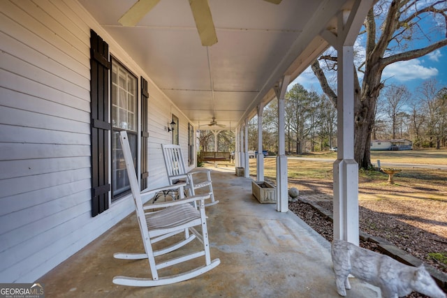 view of patio / terrace with ceiling fan and a porch