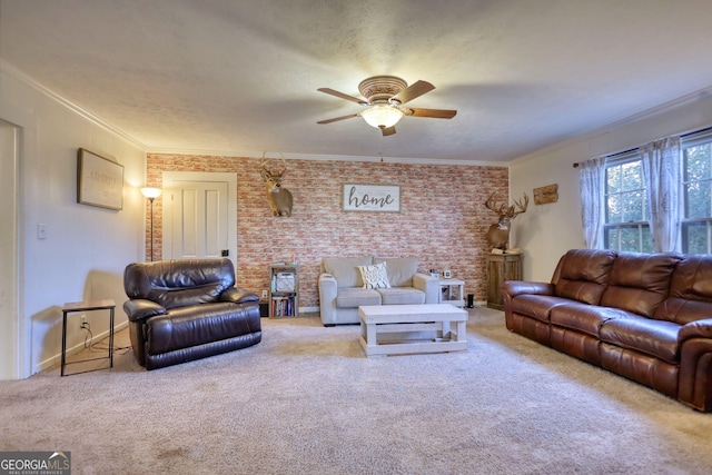 carpeted living room with crown molding, a textured ceiling, ceiling fan, and brick wall